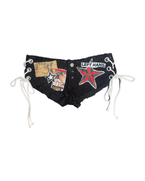 black pierced and laced booty shorts