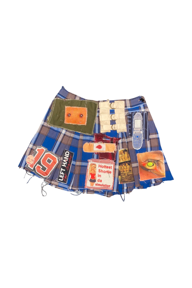 left hand Kirkland blue plaid pleated skirt
